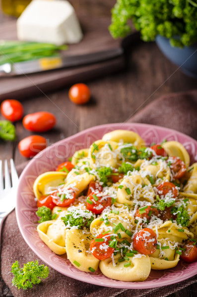 Tortellini ervas tomates fresco queijo comida Foto stock © Peteer