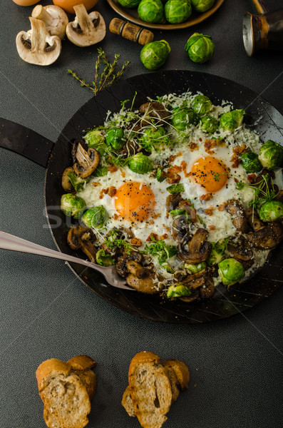 Vegetable omelet with bulls eye egg and sprouts Stock photo © Peteer