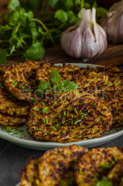 Potato pancakes fried with garlic Stock photo © Peteer