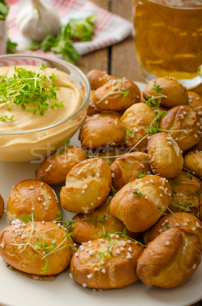 Stock photo: Pretzel rolls with cheese dip