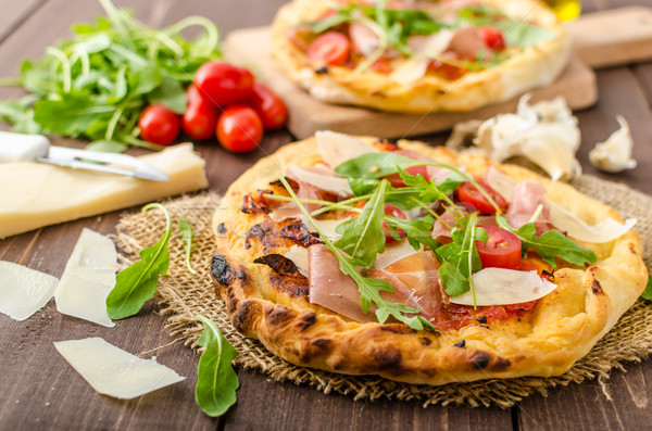 Italien pizza parmesan prosciutto faible Photo stock © Peteer