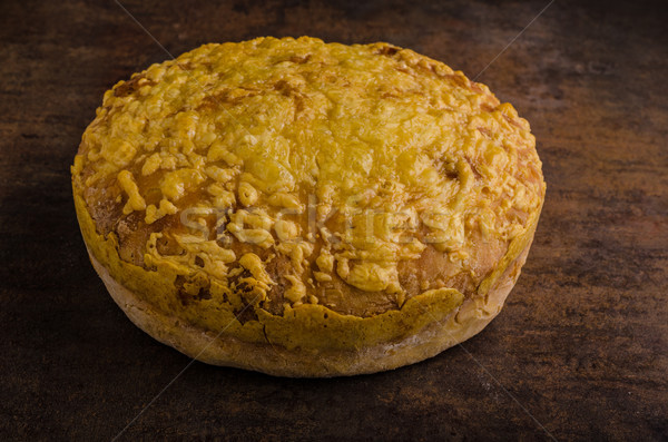 Stock photo: Cheese bread in oven