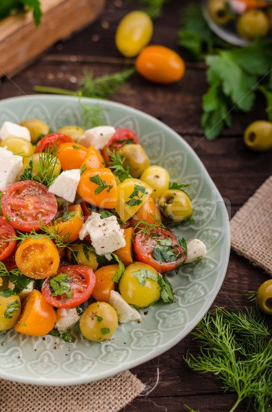 Stock photo: Fresh tomato olives salad feta cheese
