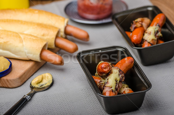 Fried sausage in a robe of bacon and cheese Stock photo © Peteer