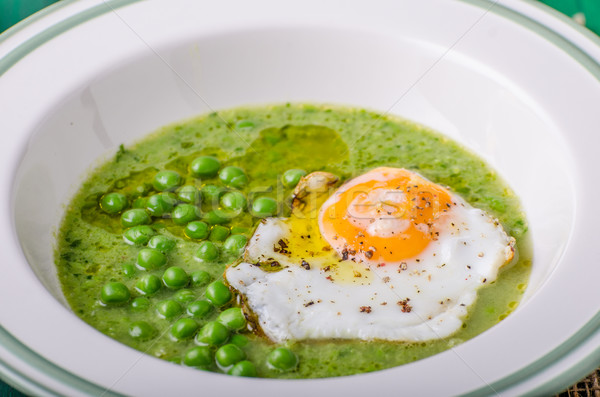 Soup of young peas Stock photo © Peteer