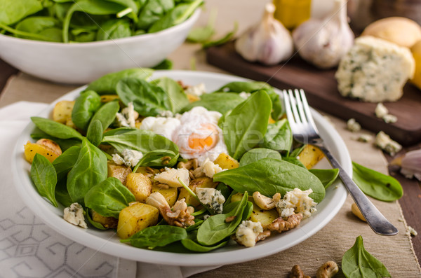 Spinach salad with egg benedict Stock photo © Peteer