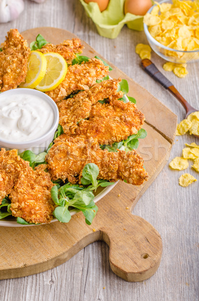 Chicken strips with delish garlic dip Stock photo © Peteer