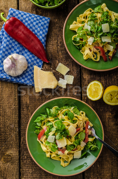 Tagliatelle with bacon, garlic and salad Stock photo © Peteer