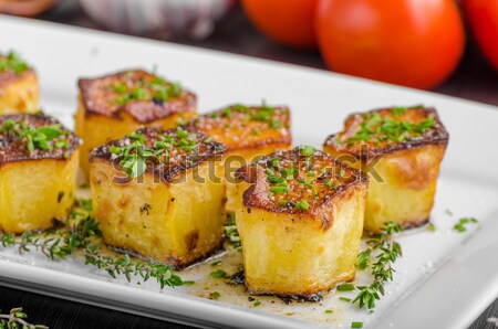 Potato fondant with garlic and herbs Stock photo © Peteer