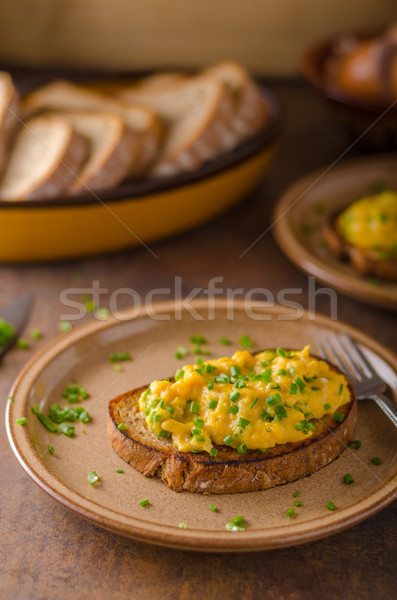 Scrambled eggs with herbs Stock photo © Peteer