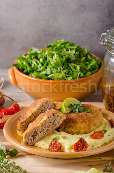 Minced meat schnitzel with cheese Stock photo © Peteer