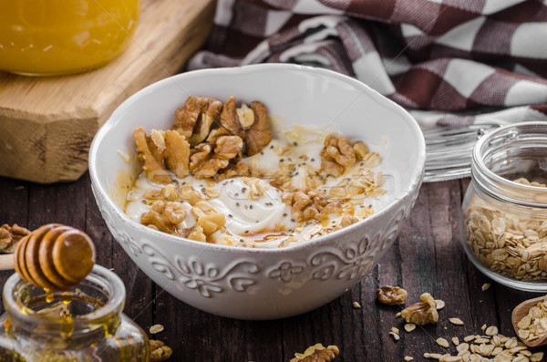 Fresh cheese with honey and walnuts Stock photo © Peteer