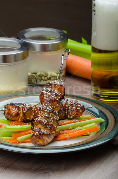 Sticky teriyaki chicken skewers with crunchy slaw Stock photo © Peteer