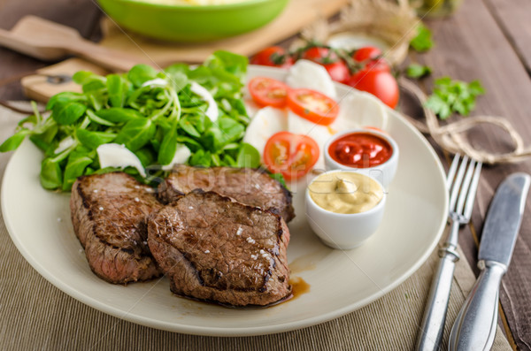 Beef steak with salad Stock photo © Peteer
