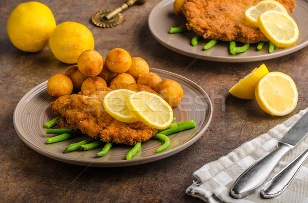 Stock photo: Wiener schnitzel with croquettes