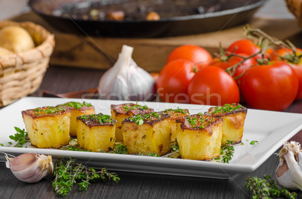 Potato fondant with garlic and herbs Stock photo © Peteer