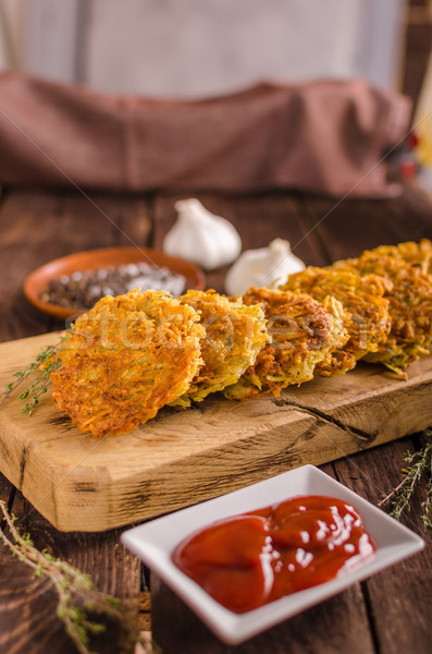 Delish potato pancakes with ketchup Stock photo © Peteer