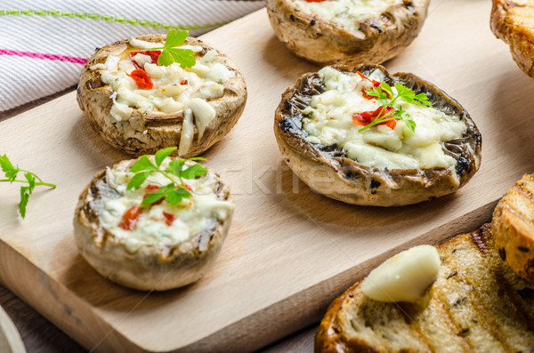 Grilled mushrooms stuffed cheese and chilli Stock photo © Peteer