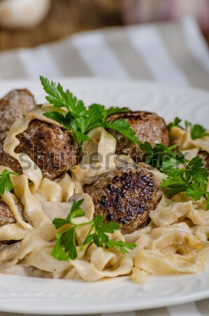 Homemade tagliatelle with meat balls Stock photo © Peteer