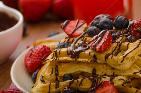Belgian waffles with blueberries, strawberries Stock photo © Peteer