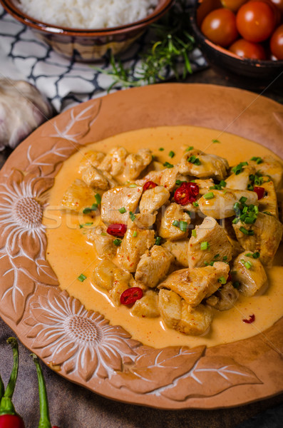 Stock photo: Chicken curry with herbs