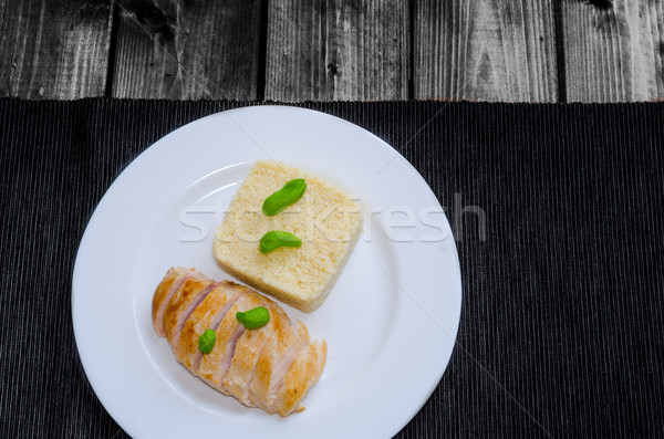 Grilled chicken breast with couscous and basil Stock photo © Peteer