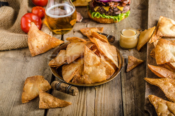 Homemade nachos with rustic burger Stock photo © Peteer