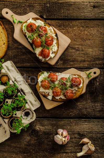 Roasted Cherry Tomato Sauce and Ricotta on Toast Stock photo © Peteer