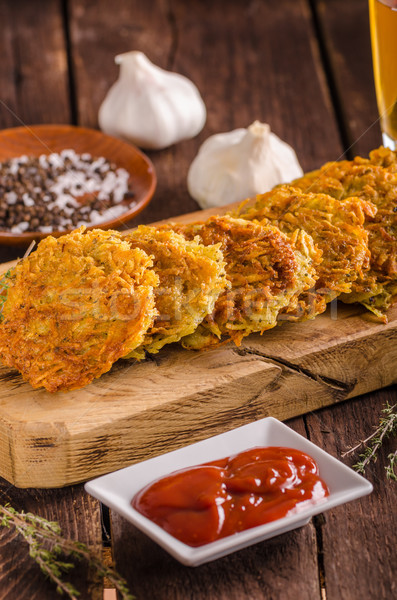 Delish potato pancakes with ketchup Stock photo © Peteer