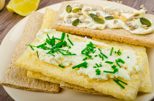 Crisp Crispbread with cheese spread with chives and Crisp Crispbread with curd cheese spread chives  Stock photo © Peteer