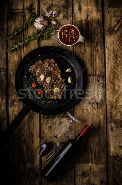 Stock photo: Rib eye steak with wine