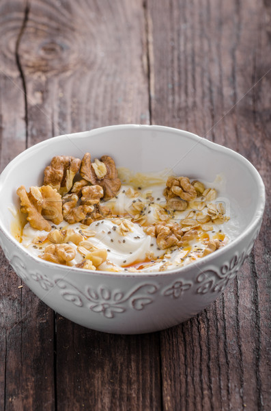 Fresh cheese with honey and walnuts Stock photo © Peteer