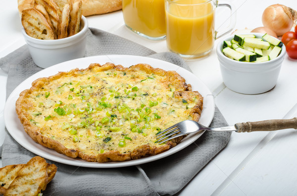 Omelette with zucchini and mozzarella cheese, scallions Stock photo © Peteer