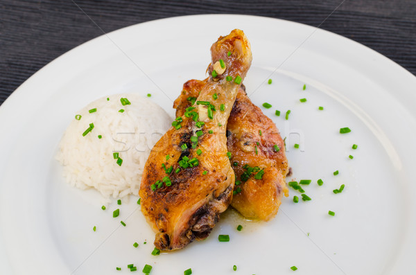 Baked chicken drumsticks Stock photo © Peteer