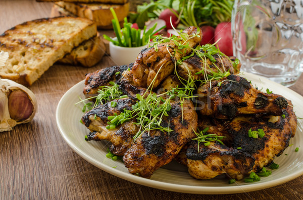 Grilled teriyaki chicken wings Stock photo © Peteer