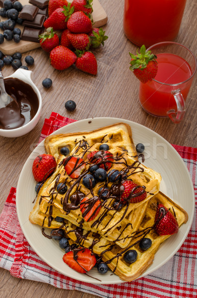 Belgian waffles with blueberries, strawberries Stock photo © Peteer