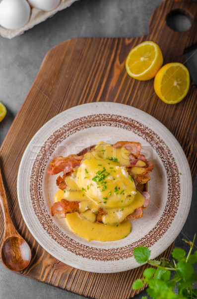 Eggs benedict with bacon Stock photo © Peteer