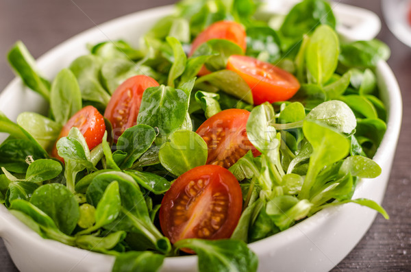 Lamb lettuce salad, tomatoes and herbs Stock photo © Peteer