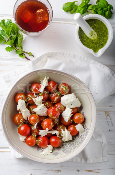 Tomate cherry ensalada pesto mozzarella frescos hierbas Foto stock © Peteer