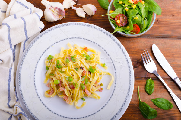 Italian pasta with spring onion and bacon Stock photo © Peteer