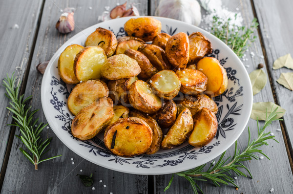 Stockfoto: Gebakken · kruiden · knoflook · oven · tabel