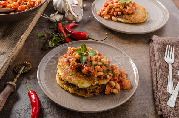 Bake beans with fluffly potato cakes Stock photo © Peteer