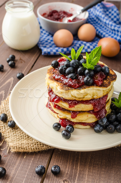 Stock photo: Glutten-free pancakes with jam and blueberries