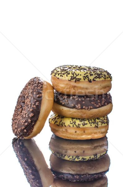 Stock photo: Donuts on reflection table