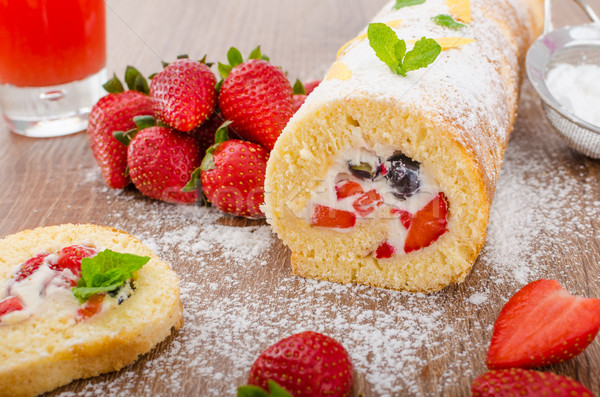 Sponge roll with strawberries and blueberries Stock photo © Peteer