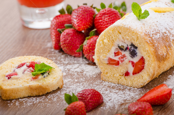 Sponge roll with strawberries and blueberries Stock photo © Peteer