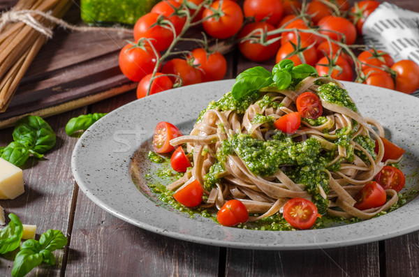 Pasta with basil pesto and parmesan Stock photo © Peteer