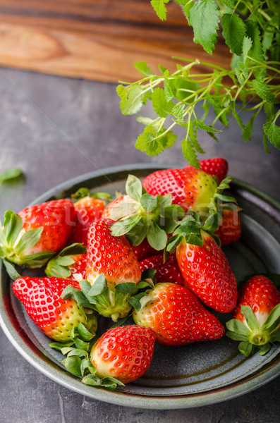 Strawberries fresh pick up Stock photo © Peteer