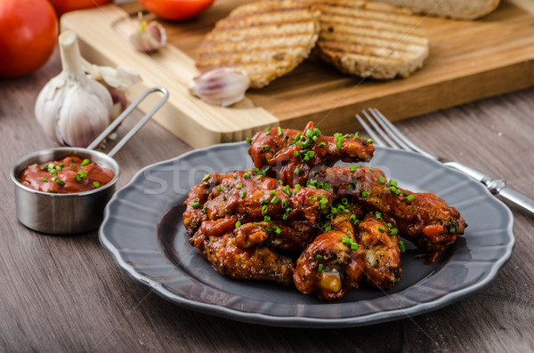 Spicy chicken wings Stock photo © Peteer