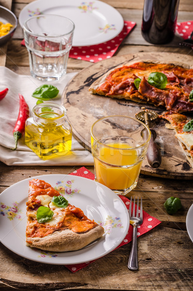 Pizza margherita rustic style Stock photo © Peteer